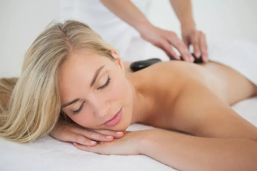 Warm Up This Winter: Try a Hot Stone Massage